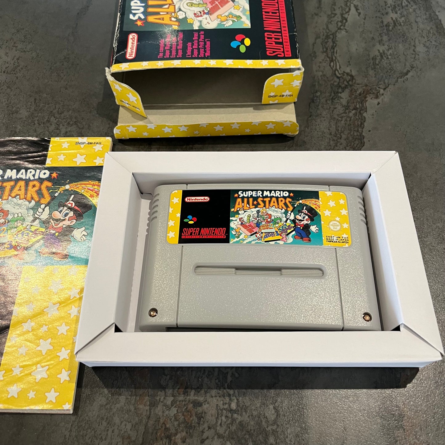 Super Mario All-Stars Super Nintendo en boîte