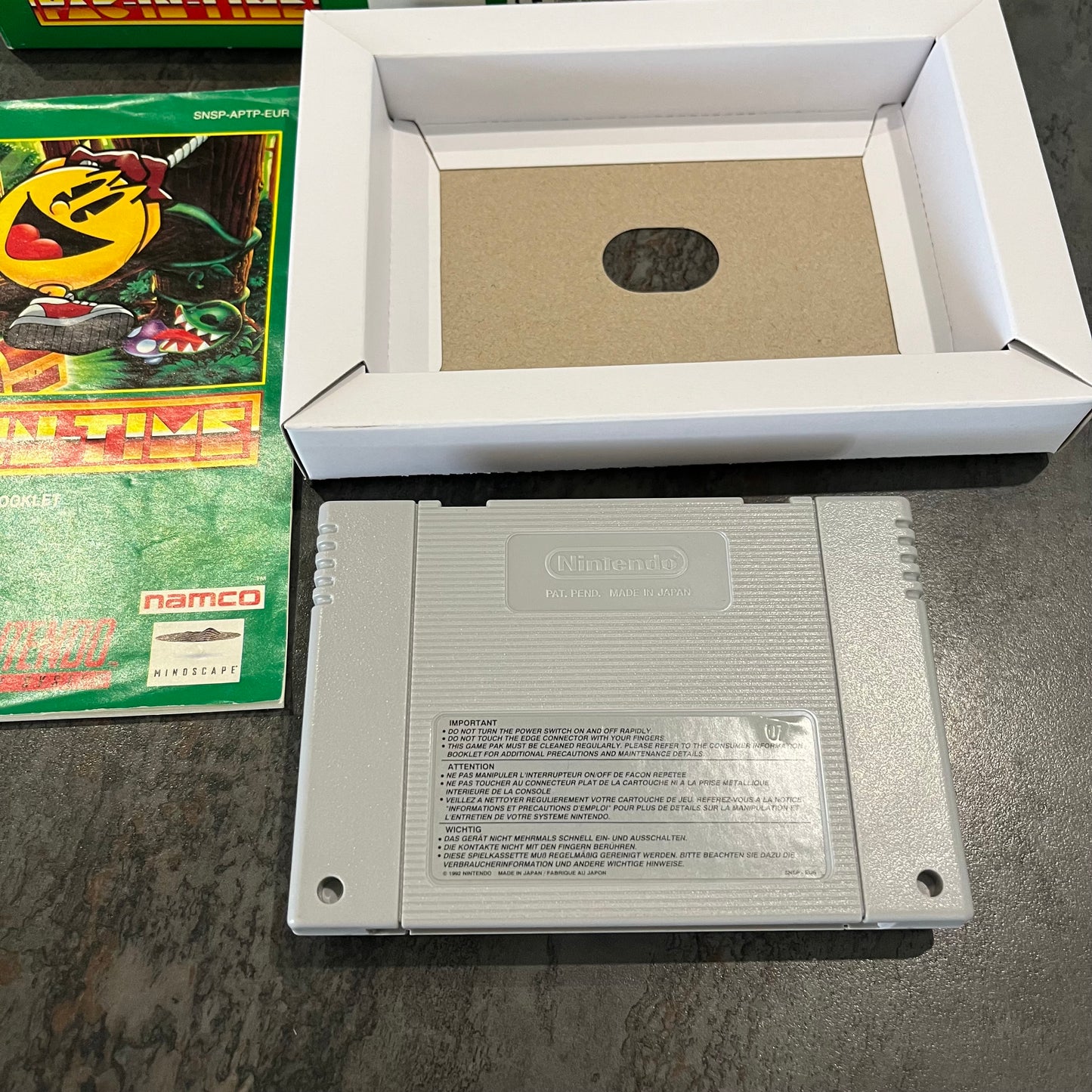 Pac-In-Time super Nintendo en boîte
